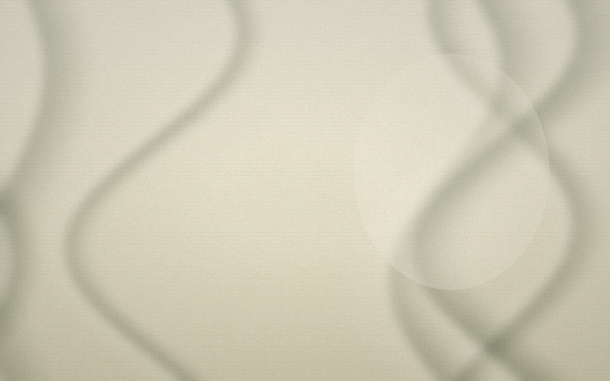 Undyed oat-coloured textile with quiet folds and raw woven texture