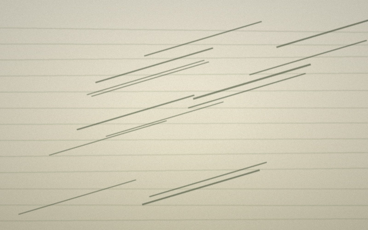 Plant stems resting across water-inspired lines in a retting process study